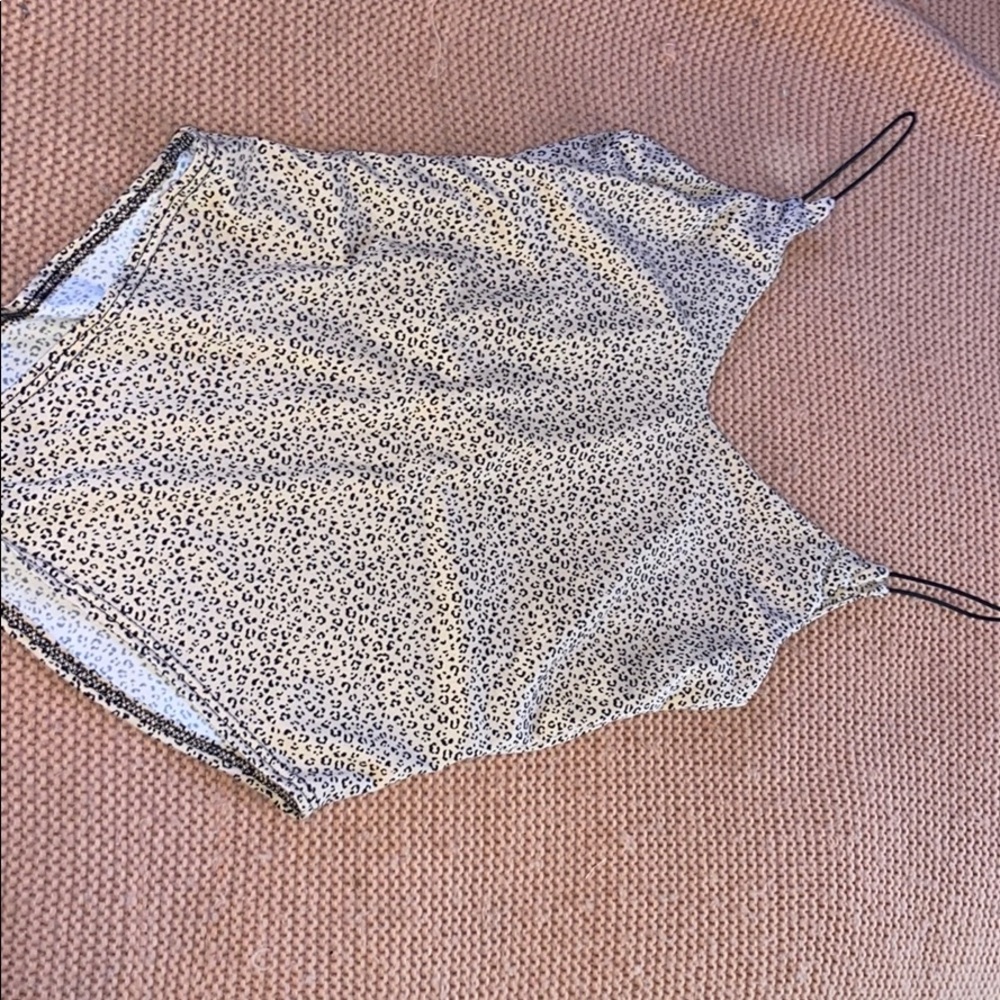 Never worn leopard body suit